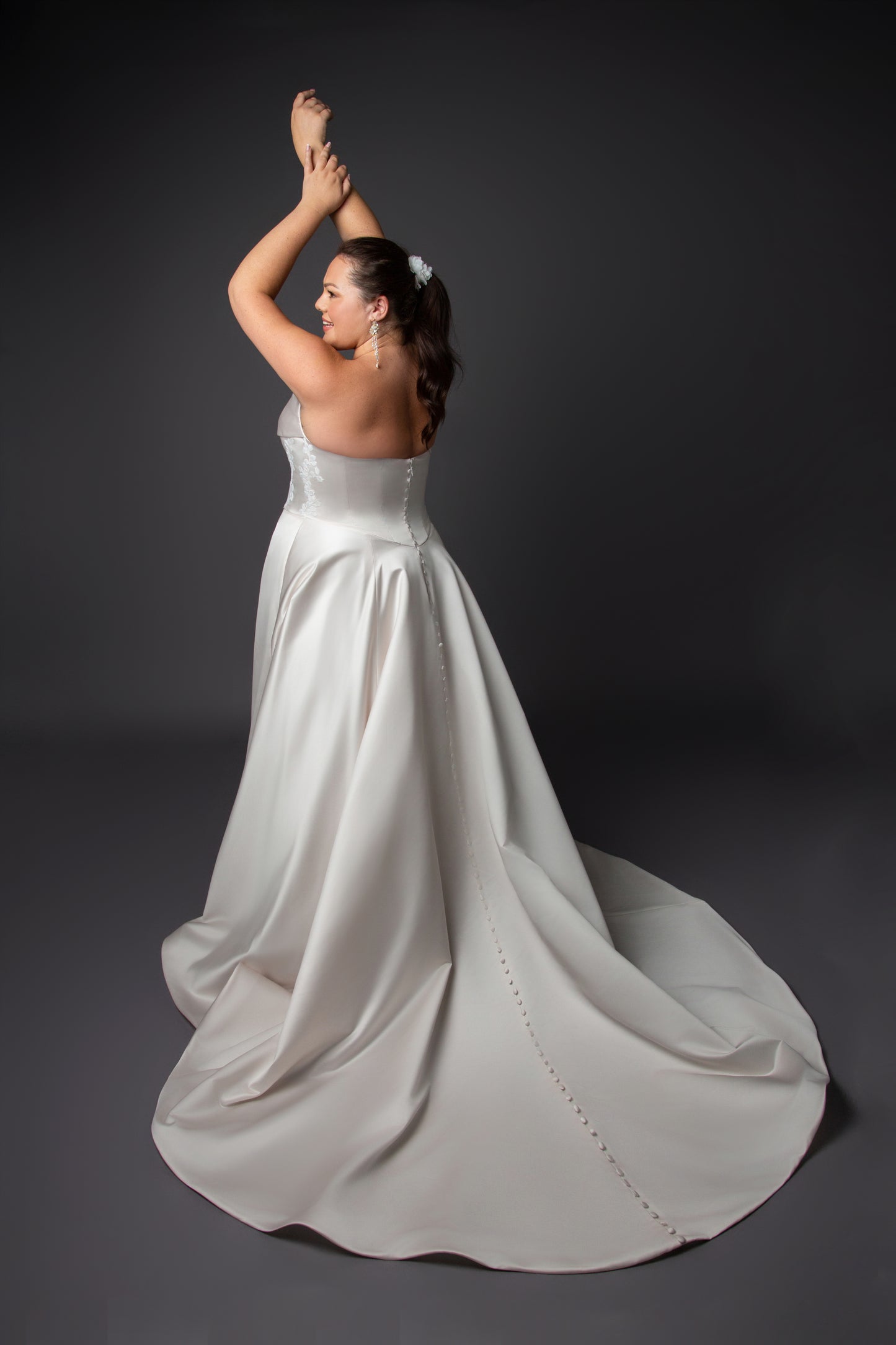 Ruched bustline wedding dress with lace details on bodice