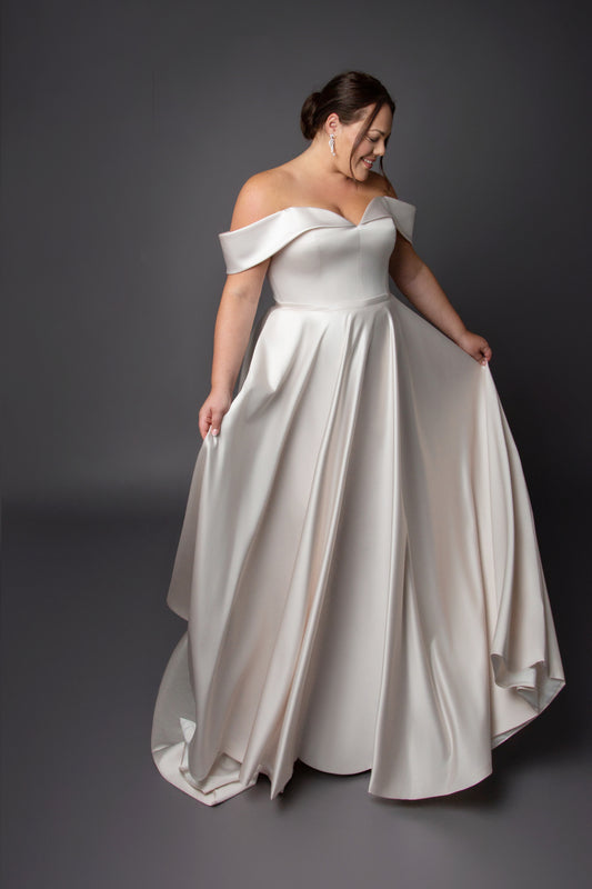 Satin A-line gown neckline with full circular skirt