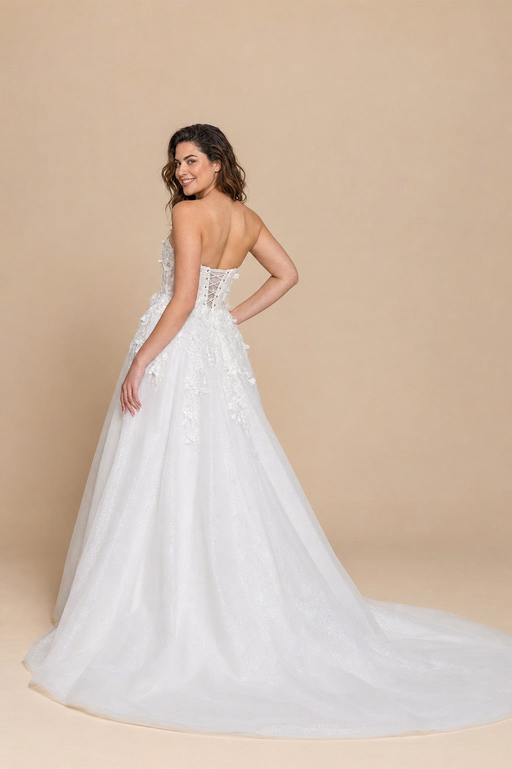 Plus Size A-Line Bridal Gown with Strapless Neckline Delicate Lace Applique and Back Tie Design