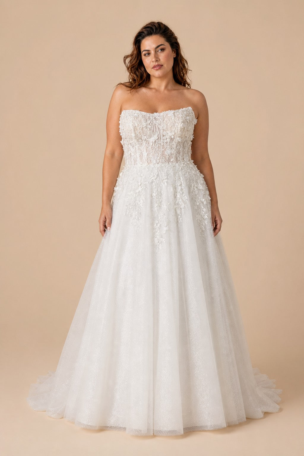 Plus Size A-Line Bridal Gown with Strapless Neckline Delicate Lace Applique and Back Tie Design