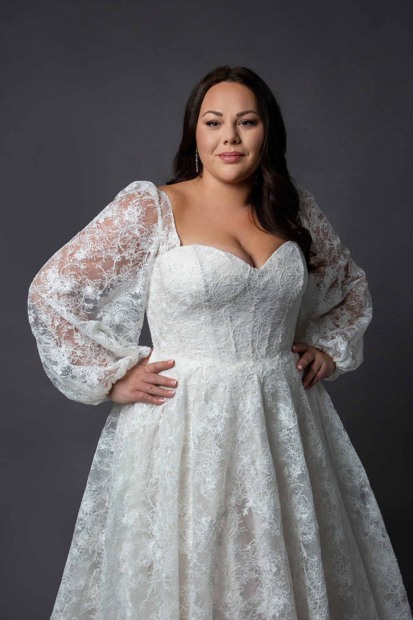 Lace bodice wedding dress with lace balloon sleeves full circular skirt