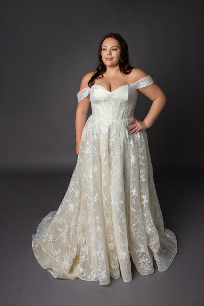 Sweetheart neckline with soft drop shoulder straps, croset style bodice