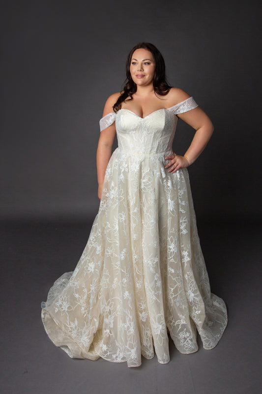 Sweetheart neckline with soft drop shoulder straps, croset style bodice