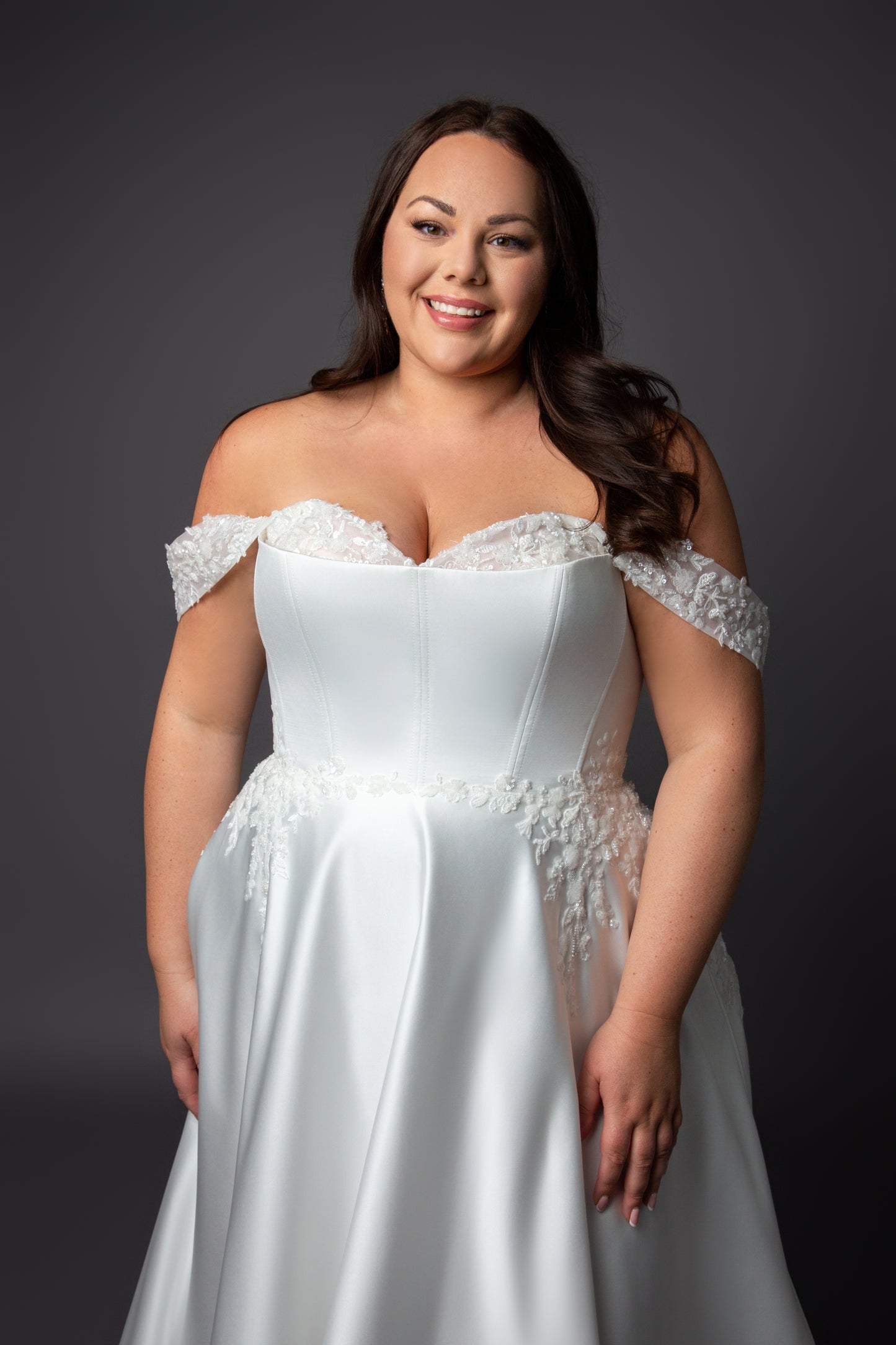 Corset style bodice wedding dress with lace drop shoulder full skirt