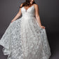 Lace wedding dress with spaghetti straps and full circular skirt