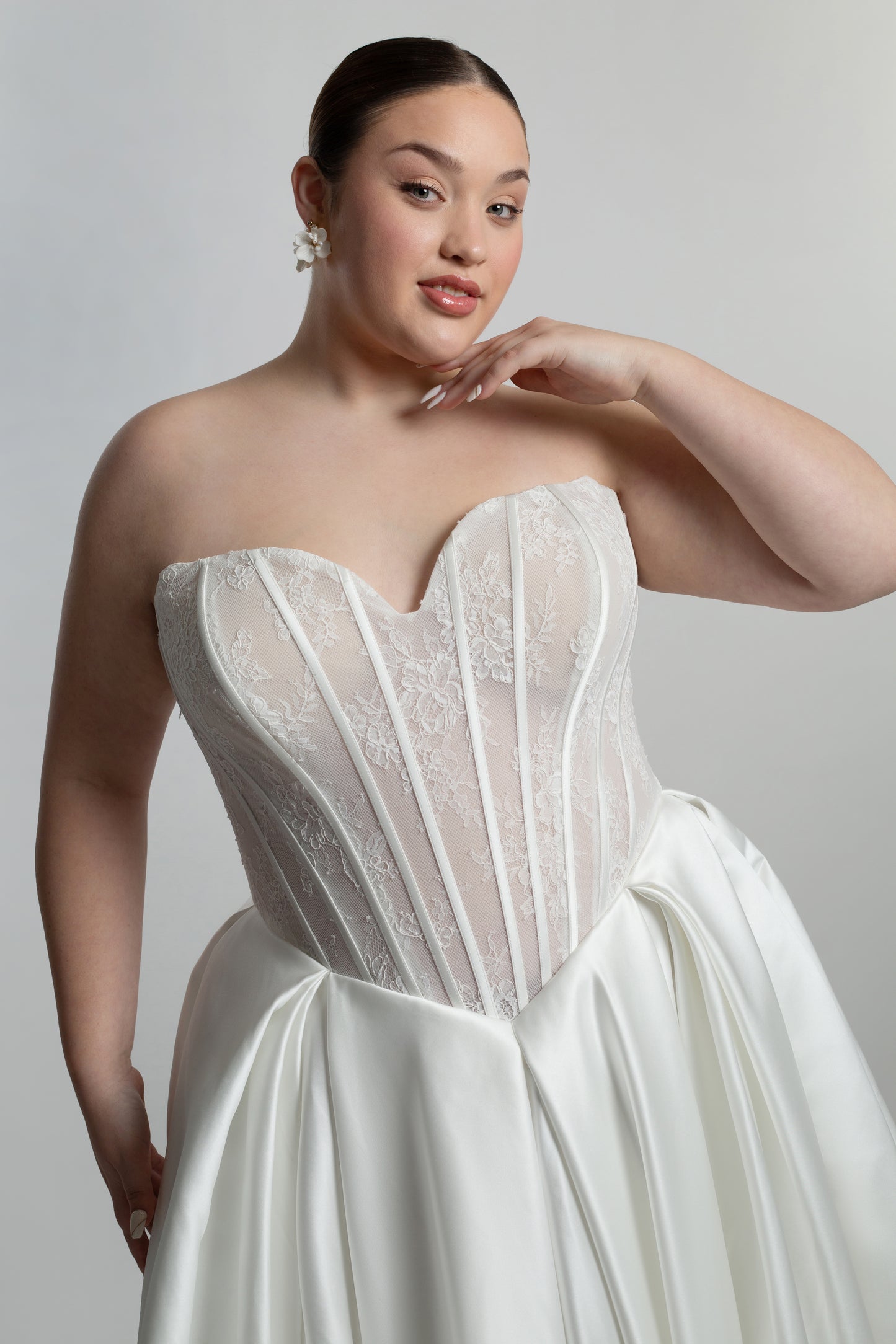 Fully boned lace strapless bodice with box pleated skirt