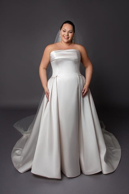 Slim Aline wedding dress with pleats on side cuff detail on bustline