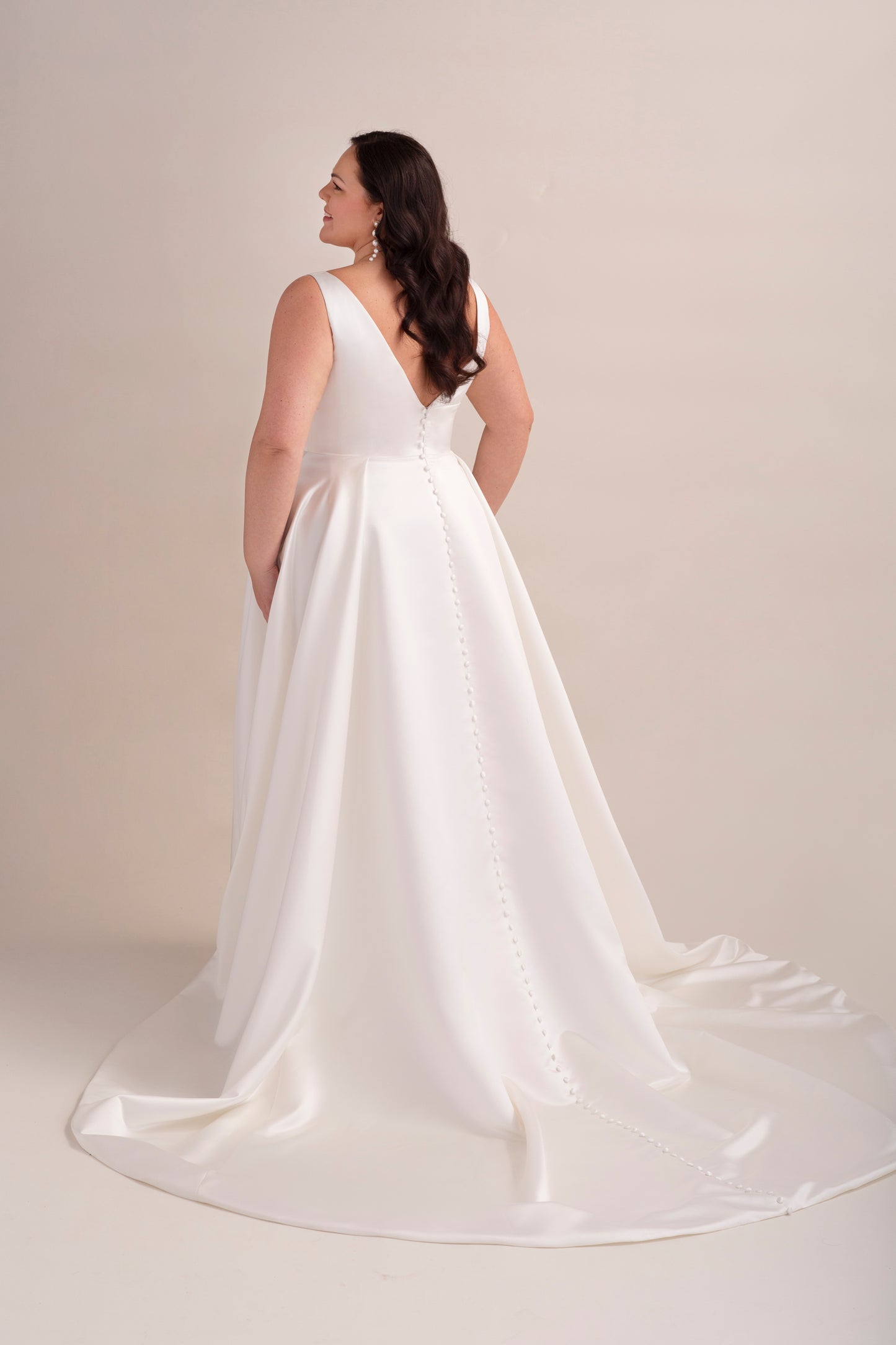 Satin A-Line Wedding Gown with Deep Plunge Neckline and Curved Bodice