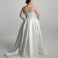 Fully boned lace strapless bodice with box pleated skirt