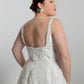 Square neckline bodice with bow detail on waistline, A-line skirt