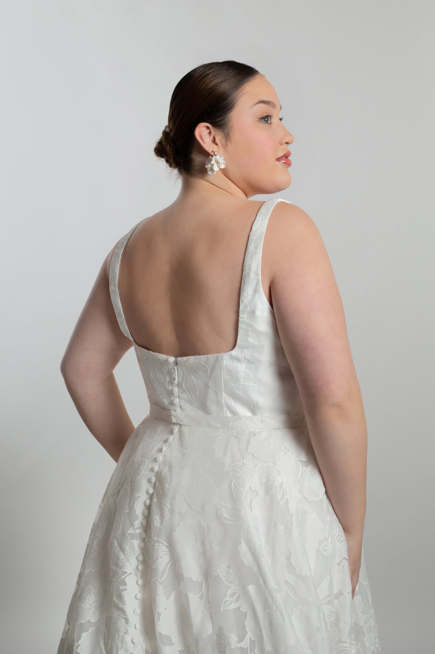 Square neckline bodice with bow detail on waistline, A-line skirt