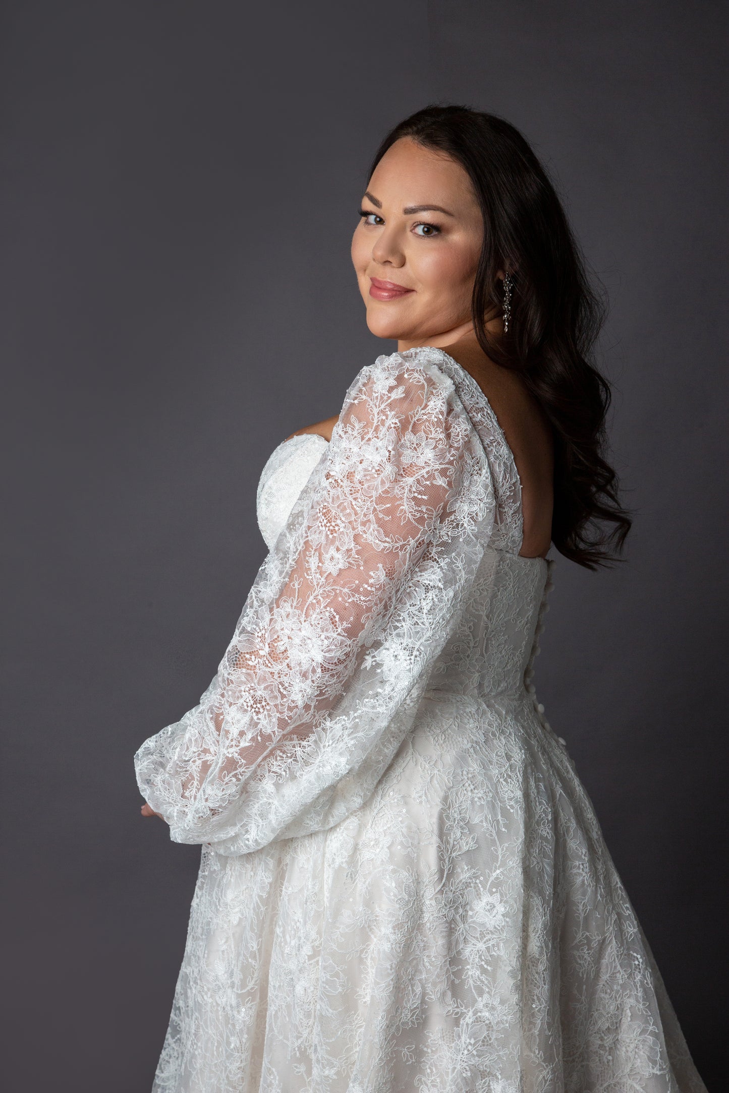 Lace bodice wedding dress with lace balloon sleeves full circular skirt