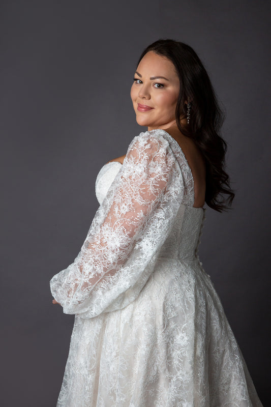 Lace bodice wedding dress with lace balloon sleeves full circular skirt