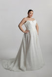 Cat eye neckline channel boned bodice paired with A-line skirt