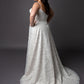 Lace wedding dress with spaghetti straps and full circular skirt