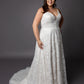 Lace wedding dress with spaghetti straps and full circular skirt