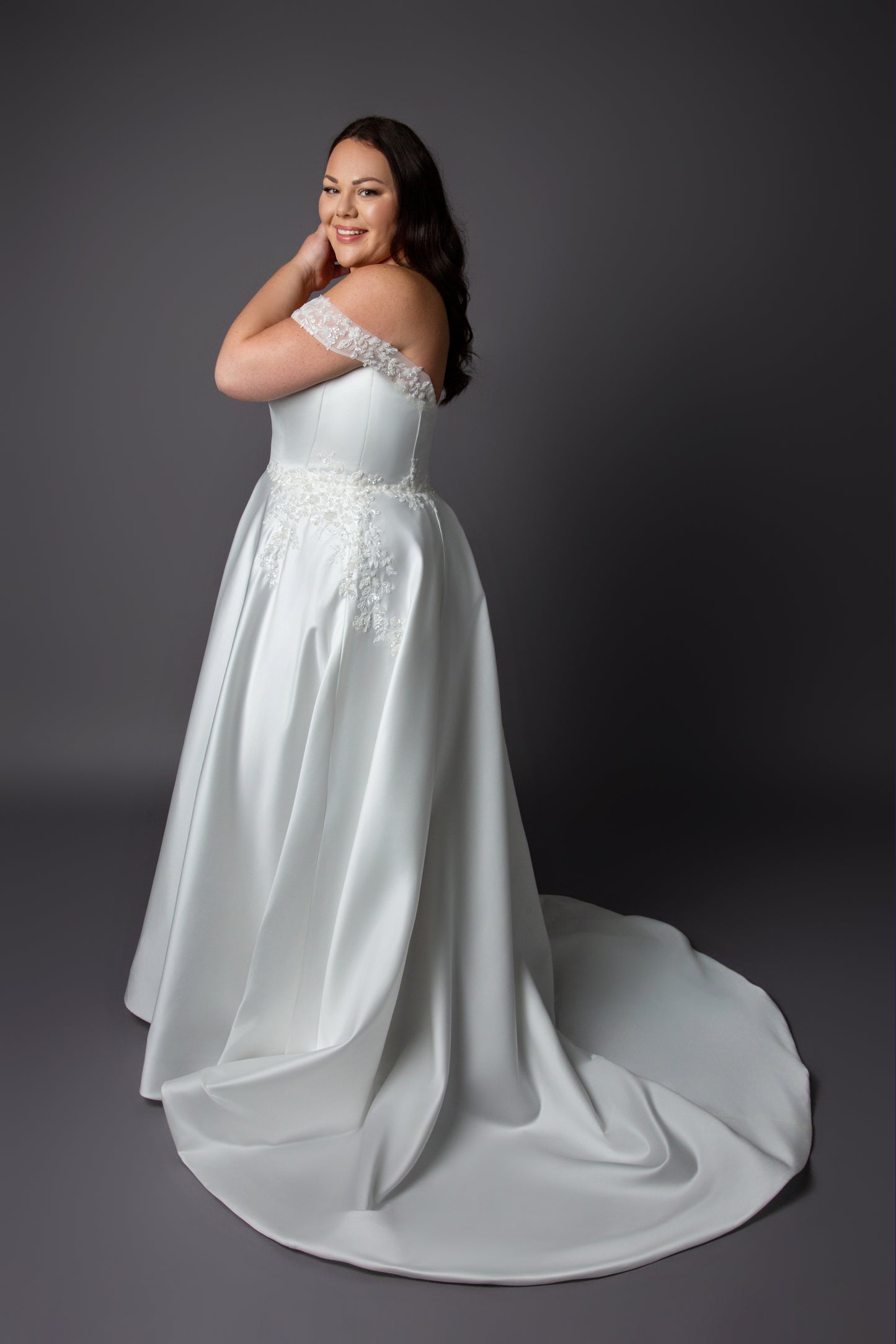 Corset style bodice wedding dress with lace drop shoulder full skirt