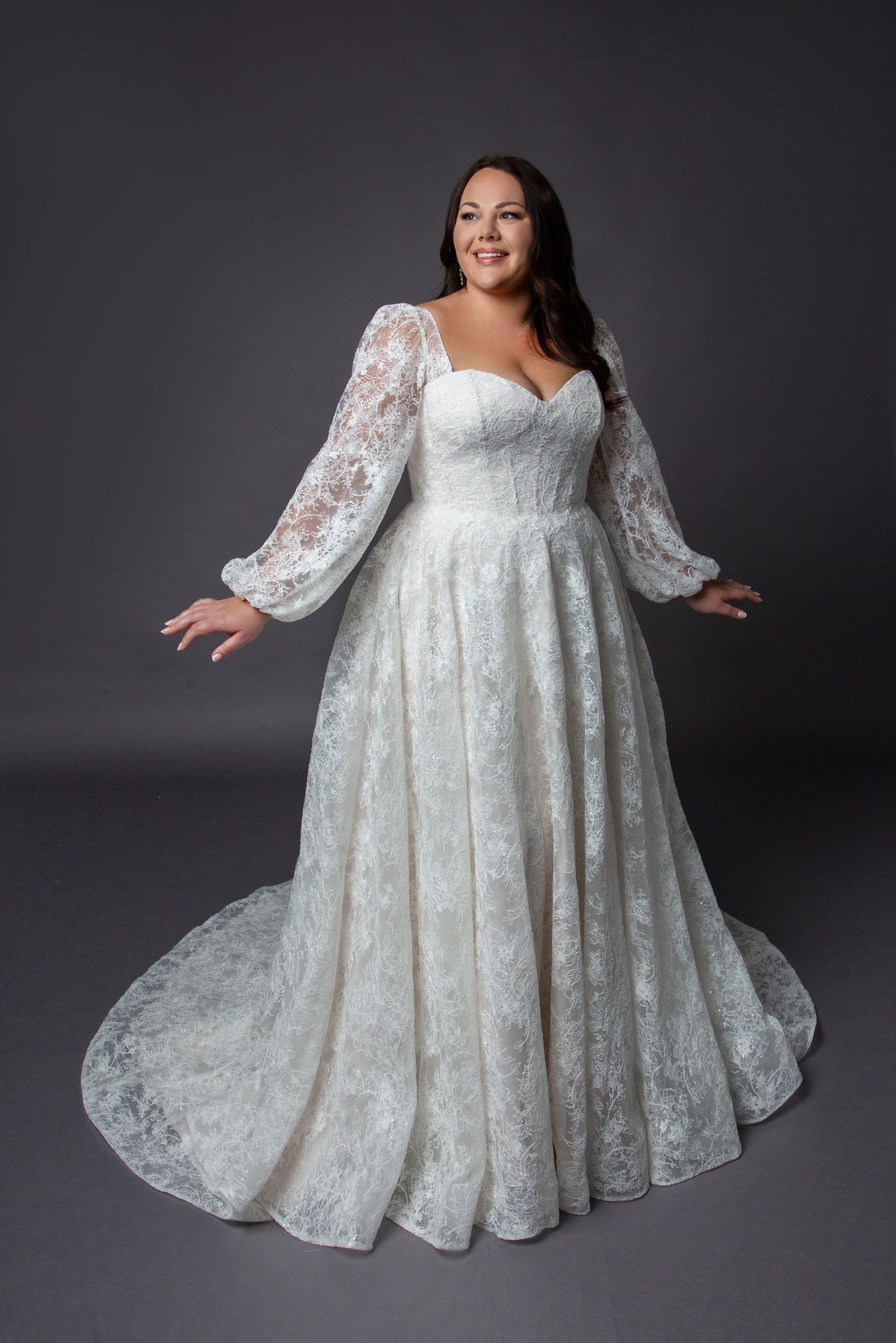 Lace bodice wedding dress with lace balloon sleeves full circular skirt