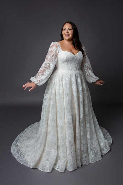 Lace bodice wedding dress with lace balloon sleeves full circular skirt