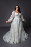 Lace bodice wedding dress with lace balloon sleeves full circular skirt