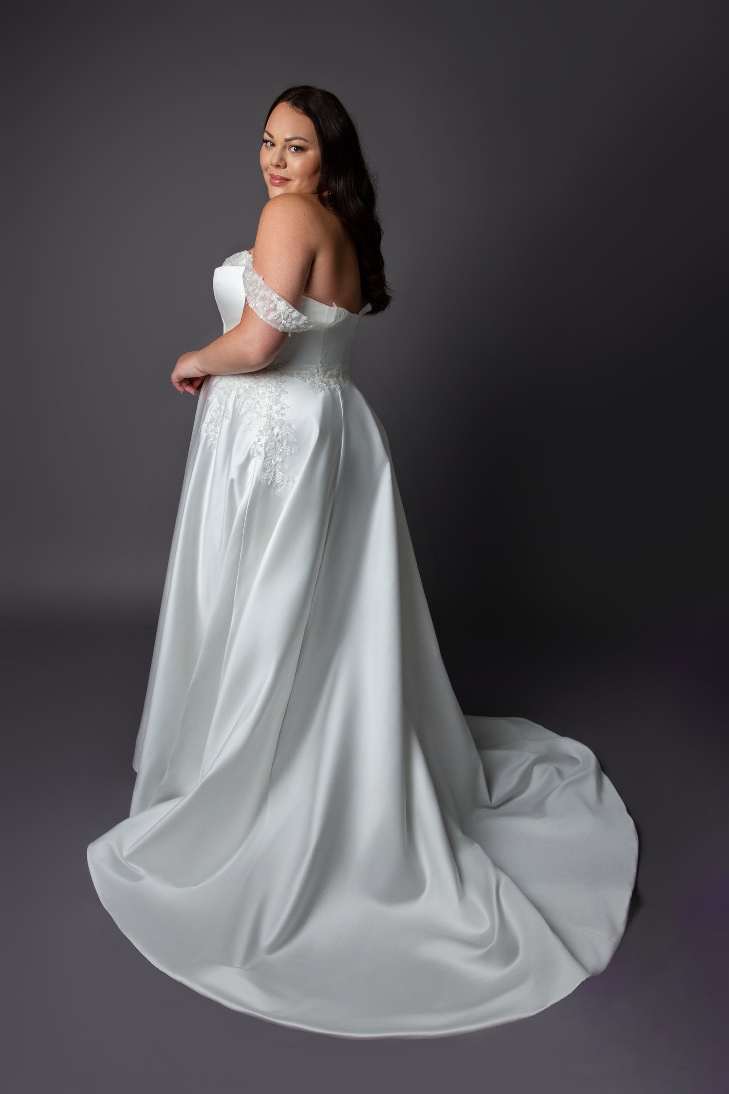 Corset style bodice wedding dress with lace drop shoulder full skirt