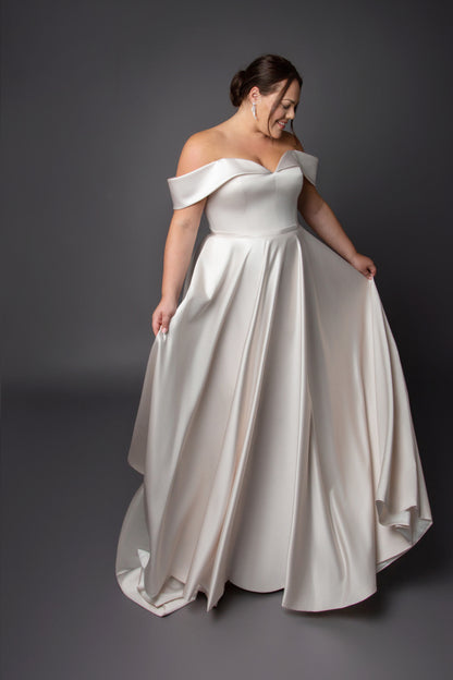 Satin A-line gown neckline with full circular skirt