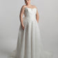 Cat eye neckline channel boned bodice paired with A-line skirt