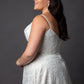Lace wedding dress with spaghetti straps and full circular skirt