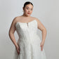 Cat eye neckline channel boned bodice paired with A-line skirt